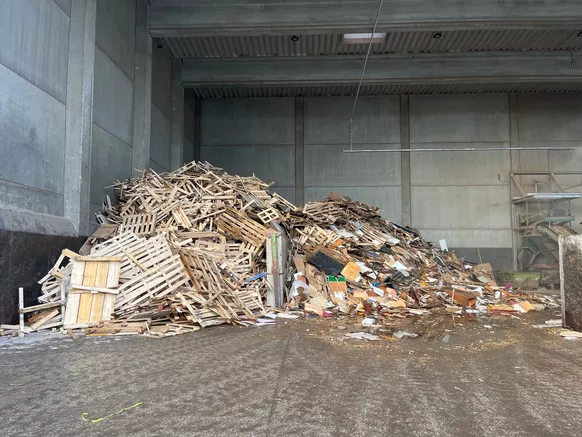 Recovered wood pile at recycling facility